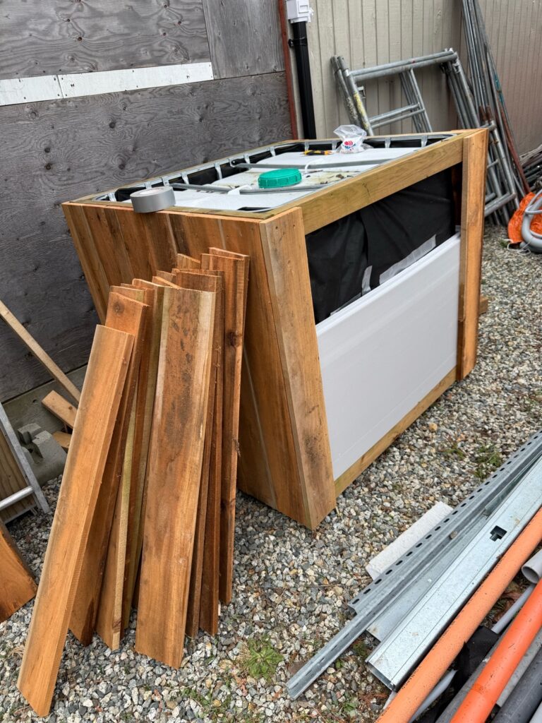 Rain barrel cedar cladding